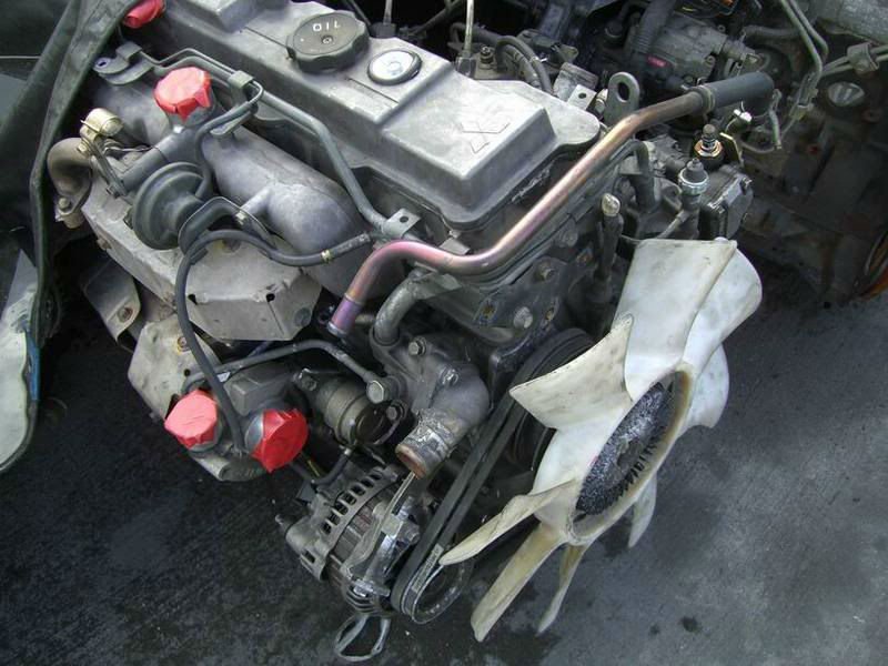 Оптимальное масло для двигателя Mitsubishi 4M40: рекомендации и советы